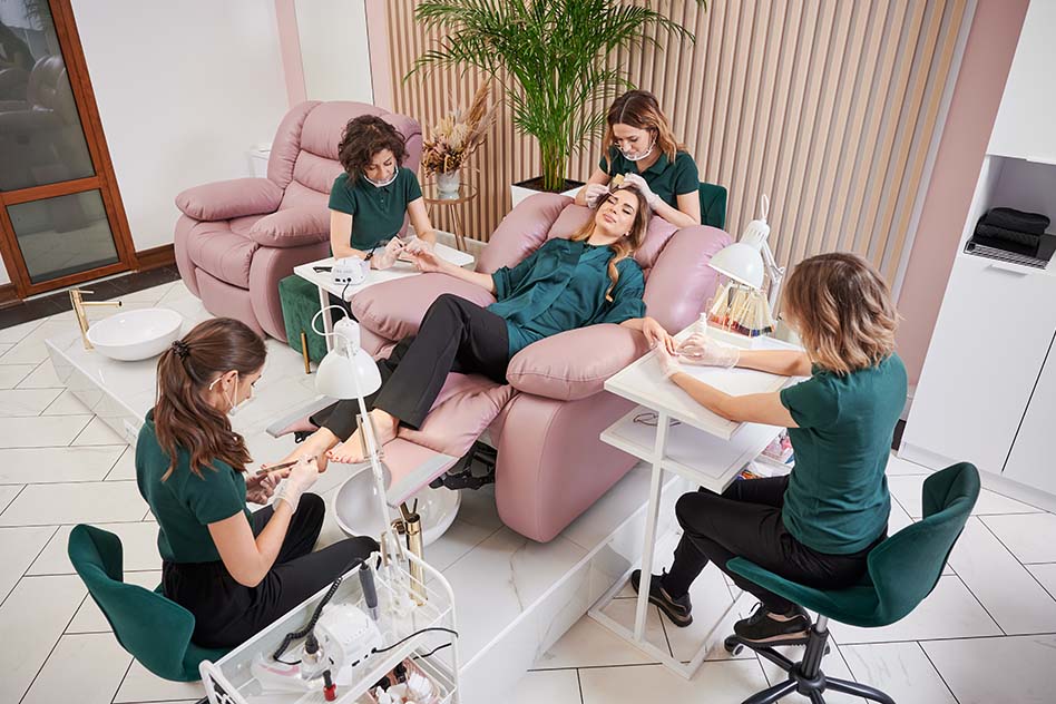 Woman having various beauty procedures in modern salon